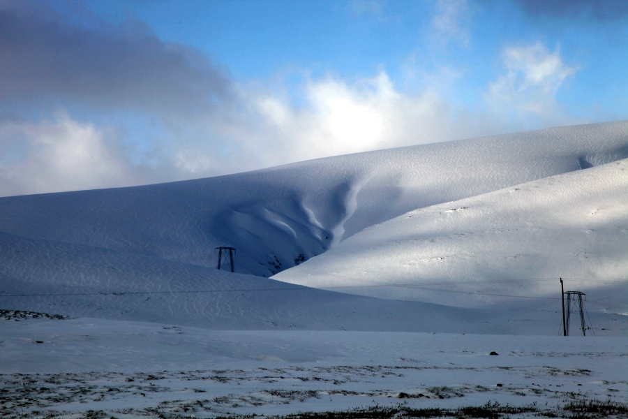 Hiking up a mountain and riding down it, Iceland, March 2012