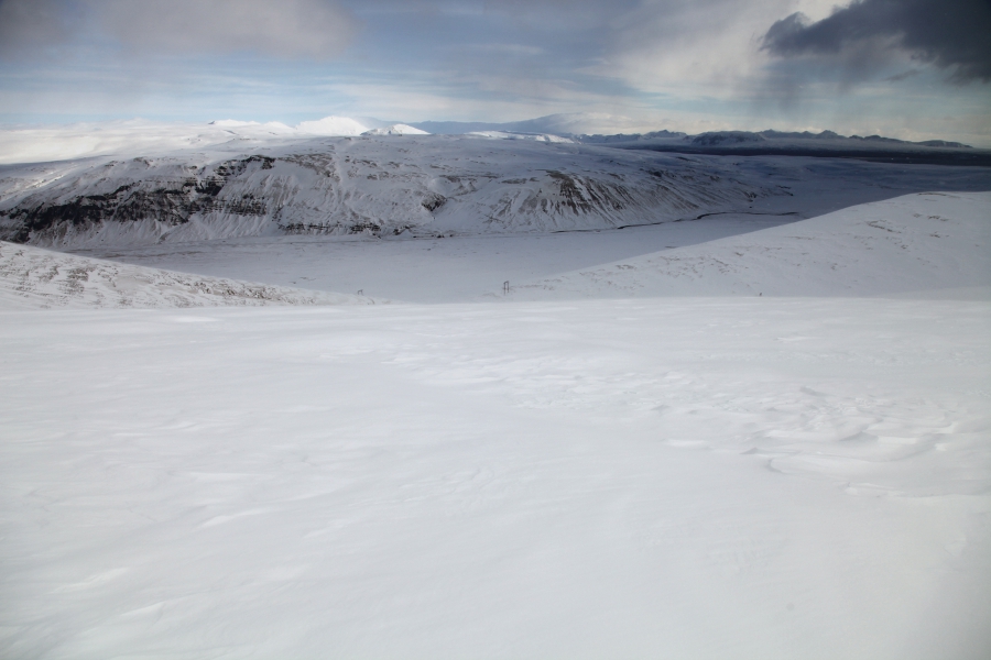 Hiking up a mountain and riding down it, Iceland, March 2012